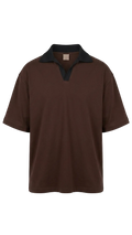 A dark brown short-sleeve drop shoulder shirt with a contrasting black collar, displayed against a plain white background.