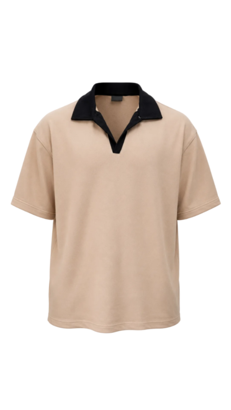 A short-sleeve drop shoulder shirt in beige with a contrasting black collar and split placket, shown against a plain white background.